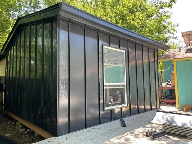 Black standing seam metal wall panels for Metal Roof Installation in Green Hill