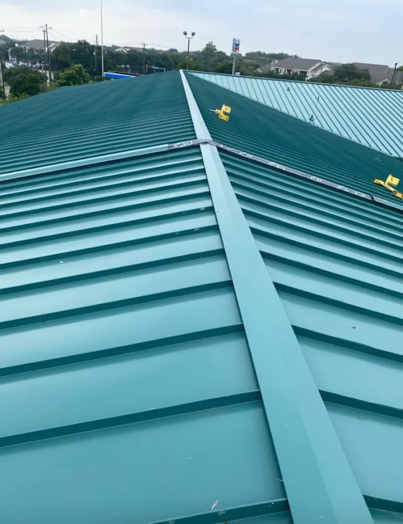 Green commercial metal roof ridge and valley for Metal Roof Repair in Green Hill